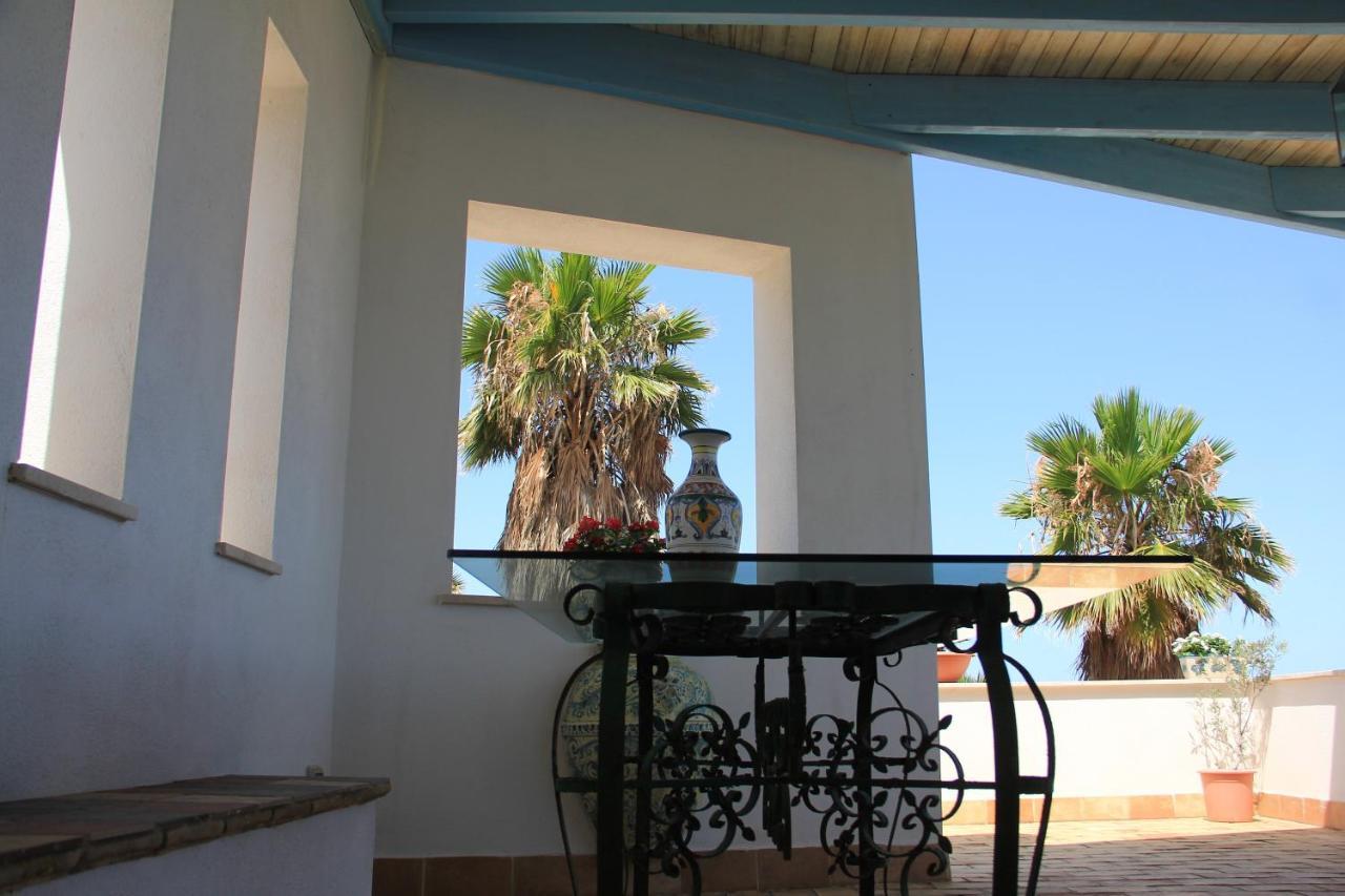 Punta Bianca Suite & Home Experience Агридженто Экстерьер фото