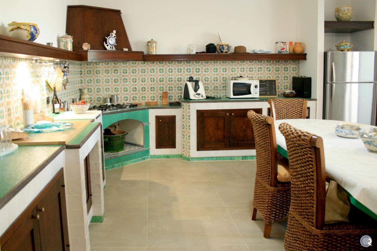 Punta Bianca Suite & Home Experience Агридженто Экстерьер фото